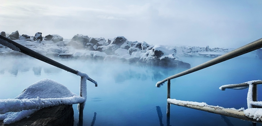 Winter scenery of Myvatn Nature Baths with icy blue waters and steam / Copyright: Visit North Iceland 